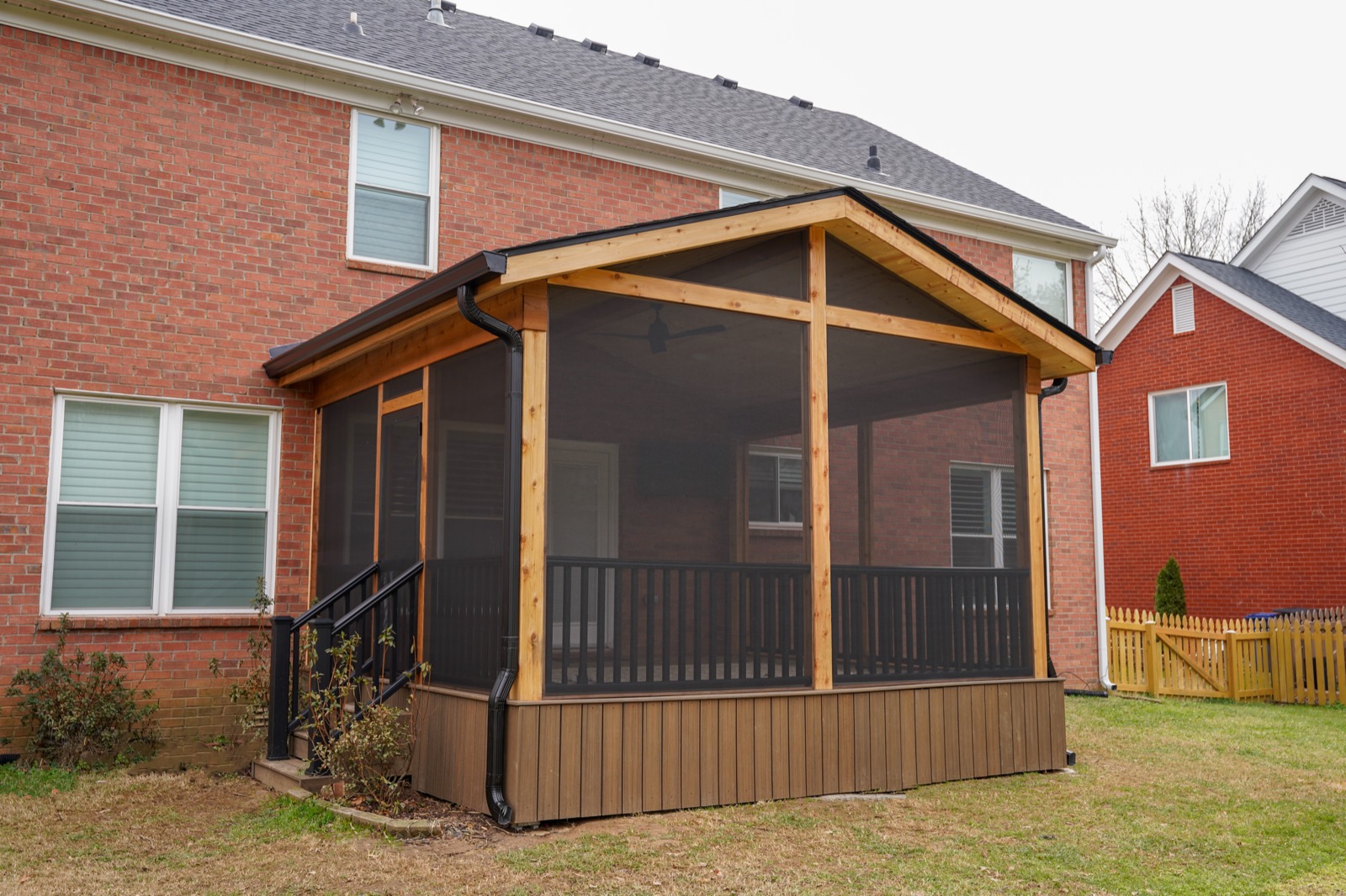 After — custom cedar screened porch built